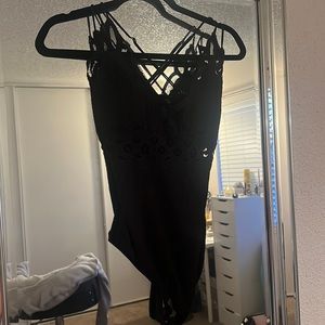Black, lacy bodysuit